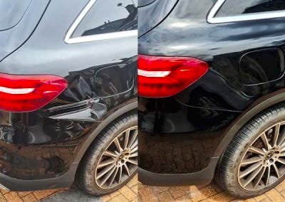 Mercedes side panel dent on black car repairs by Rapid Paintwork Reading